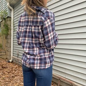 Top is a plaid red white and blue flannel from Brandy Melville OS.